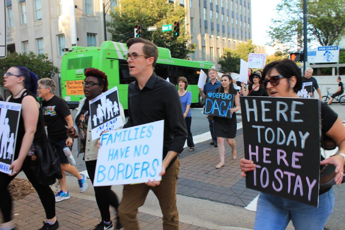 A Call to Action: Procession for immigrants in downtown W-S