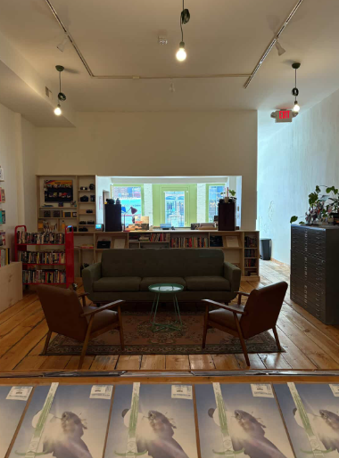 Low Five Analog Archive’s main store area, with a large setting area and a selection of vinyl records to choose from.