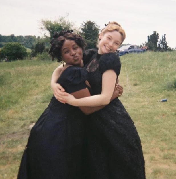 Behind the scenes photo of Hannah Dodd and Masali Baduza on the set of “Bridgerton”